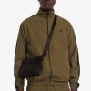 Bolsos laterales de tricot con cinta tonal Bolsos laterales de tricot con cinta tonal