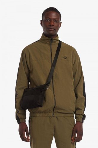 Bolsos laterales de tricot con cinta tonal