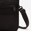 Bolsos laterales de tricot con cinta tonal Bolsos laterales de tricot con cinta tonal