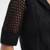 Camisa de mujer con botones y punto abierto