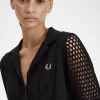 Camisa de mujer con botones y punto abierto