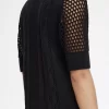 Camisa de mujer con botones y punto abierto