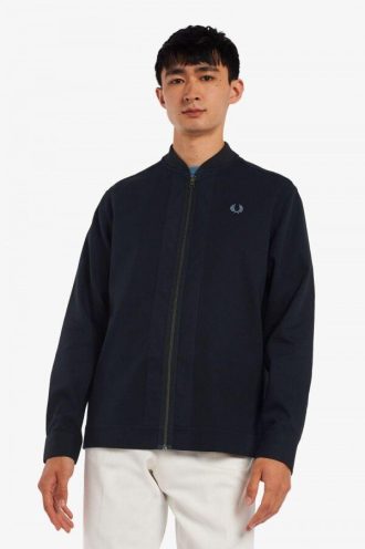 Camisas con cuello de bombardero y cremallera