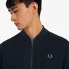 Camisas con cuello de bombardero y cremallera