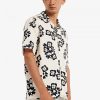 Camisas con cuello de solapa y estampado floral