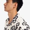 Camisas con cuello de solapa y estampado floral