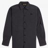 Camisas con sobrecamisa y detalle de parche