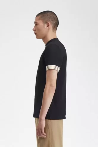 Camiseta de hombre con puños a rayas