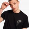 Camisetas con parche estampado en el pecho