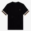 Camisetas de piqué con puños a rayas