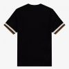 Camisetas de piqué con puños a rayas