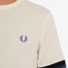 Camisetas de piqué con puños a rayas