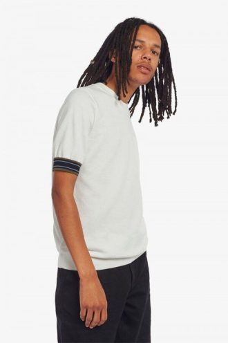 Camisetas de punto con puños a rayas