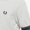 Camisetas de punto con puños a rayas