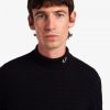 Jersey de cuello alto con textura de chevrón