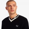 Jersey de punto con cuello en V y ribete abstracto