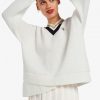 Jersey de punto con cuello en V y ribetes