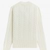 Jersey de punto trenzado con cuello en V