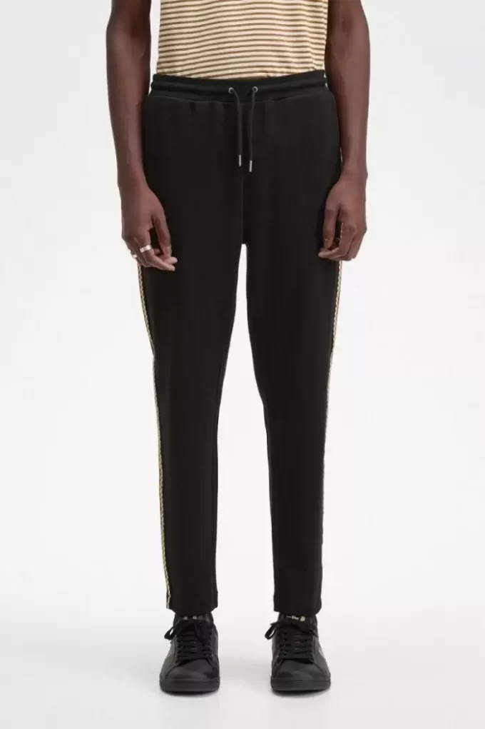 Pantalones deportivos con cinta de cuadros para hombre