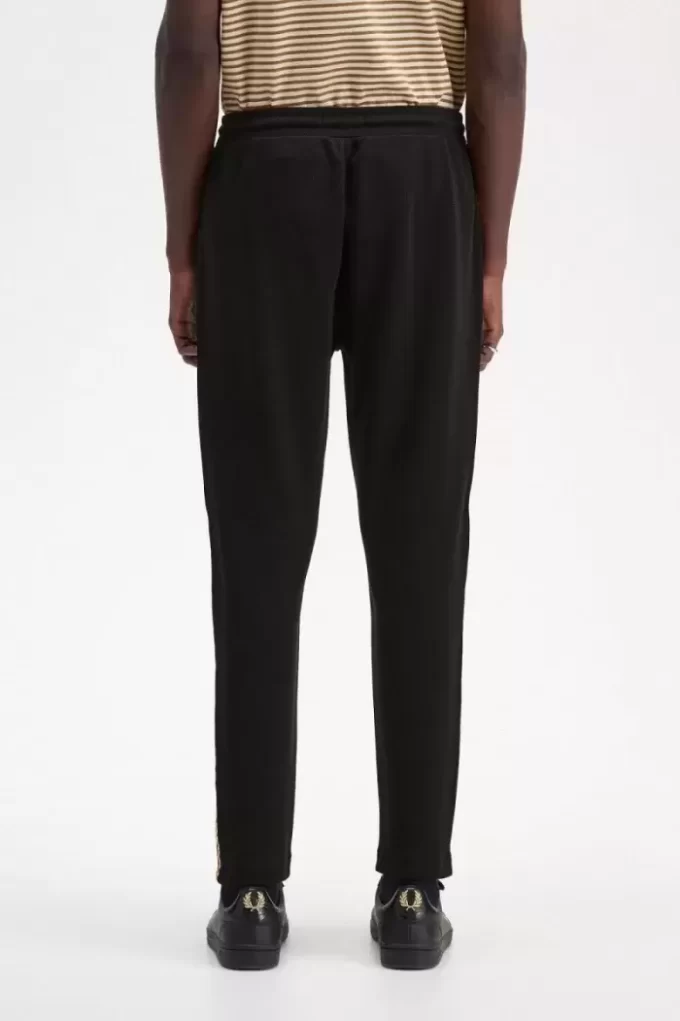 Pantalones deportivos con cinta de cuadros para hombre