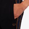 Pantalones deportivos con cinta de rayas Pantalones deportivos con cinta de rayas