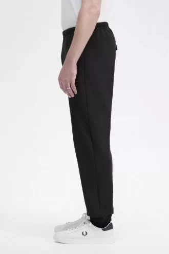Pantalones deportivos con detalle de insignia para hombre