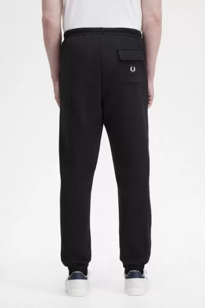 Pantalones deportivos con detalle de insignia para hombre