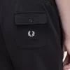 Pantalones deportivos con detalle de insignia para hombre