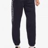 Pantalones deportivos con paneles y cinta