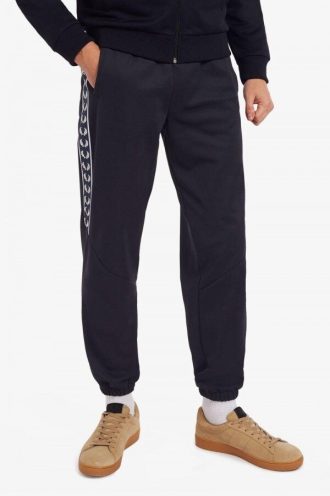 Pantalones deportivos con paneles y cinta