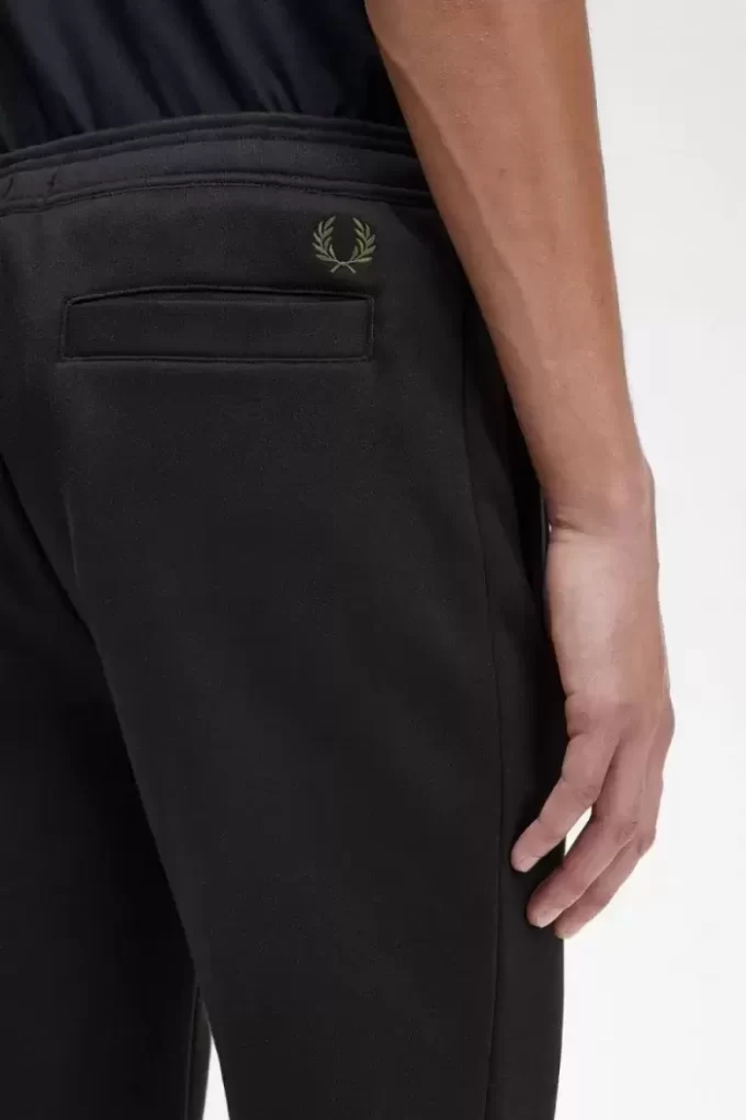 Pantalones deportivos de marca gráfica para hombre