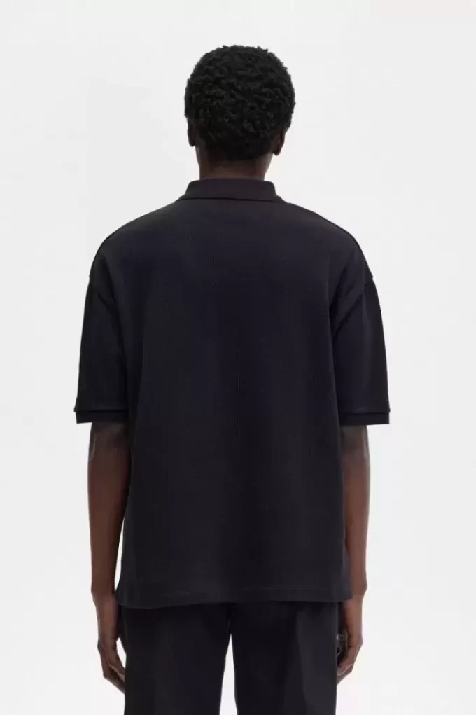 Polo de hombre con estampado de gran tamaño