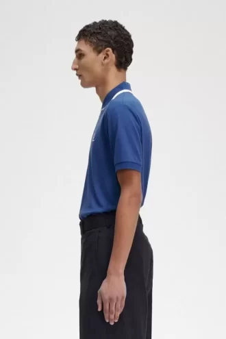 Polo de hombre con media cremallera Polo de hombre con media cremallera