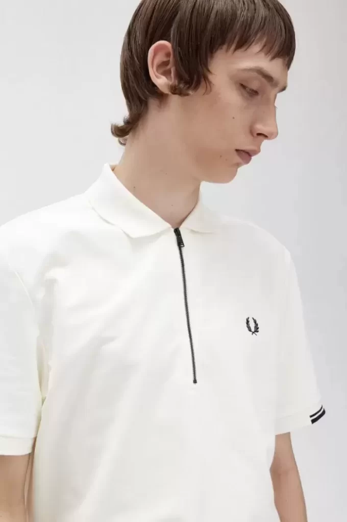 Polo de hombre con media cremallera Polo de hombre con media cremallera