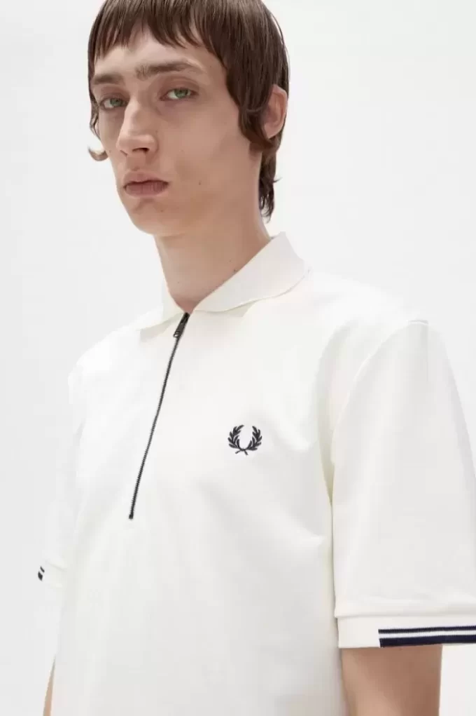 Polo de hombre con media cremallera Polo de hombre con media cremallera
