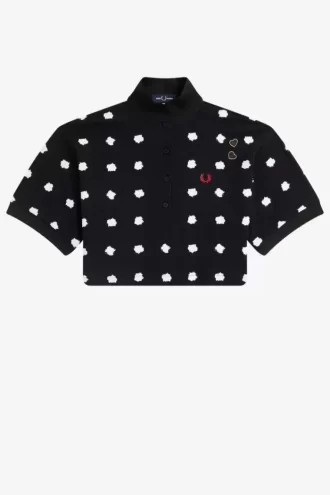 Polo de mujer en piqué con estampado de lunares