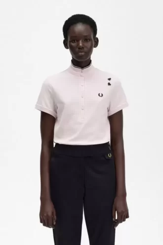 Polo de piqué con ribete para mujer