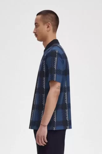 Polo de tartán con cuello con cremallera para hombre Polo de tartán con cuello con cremallera para hombre