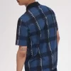 Polo de tartán con cuello con cremallera para hombre