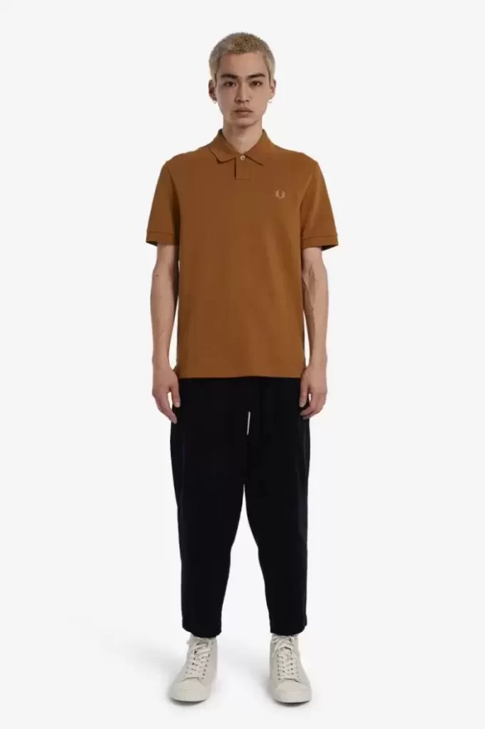 Polo de un botón para hombre