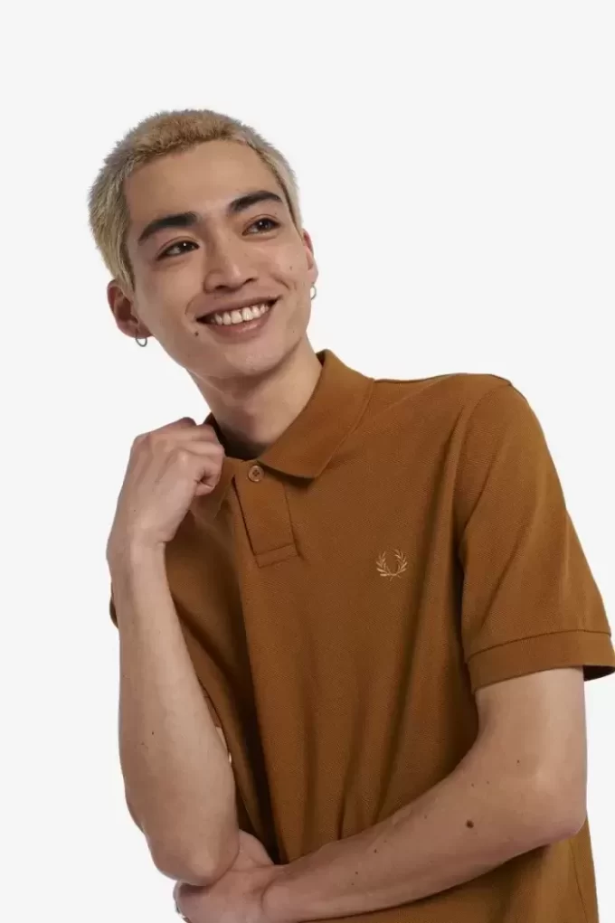 Polo de un botón para hombre
