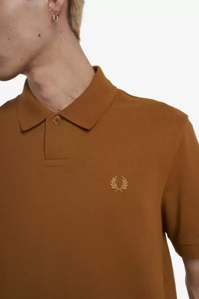 Polo de un botón para hombre