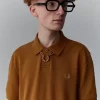 Polo de un botón para hombre