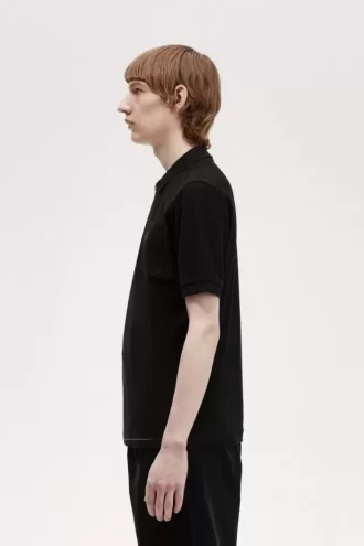 Polo texturizado con cuello y cremallera para hombre