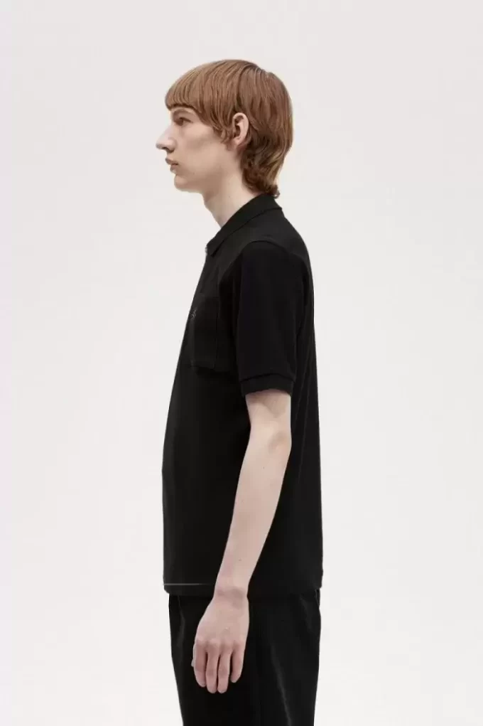 Polo texturizado con cuello y cremallera para hombre