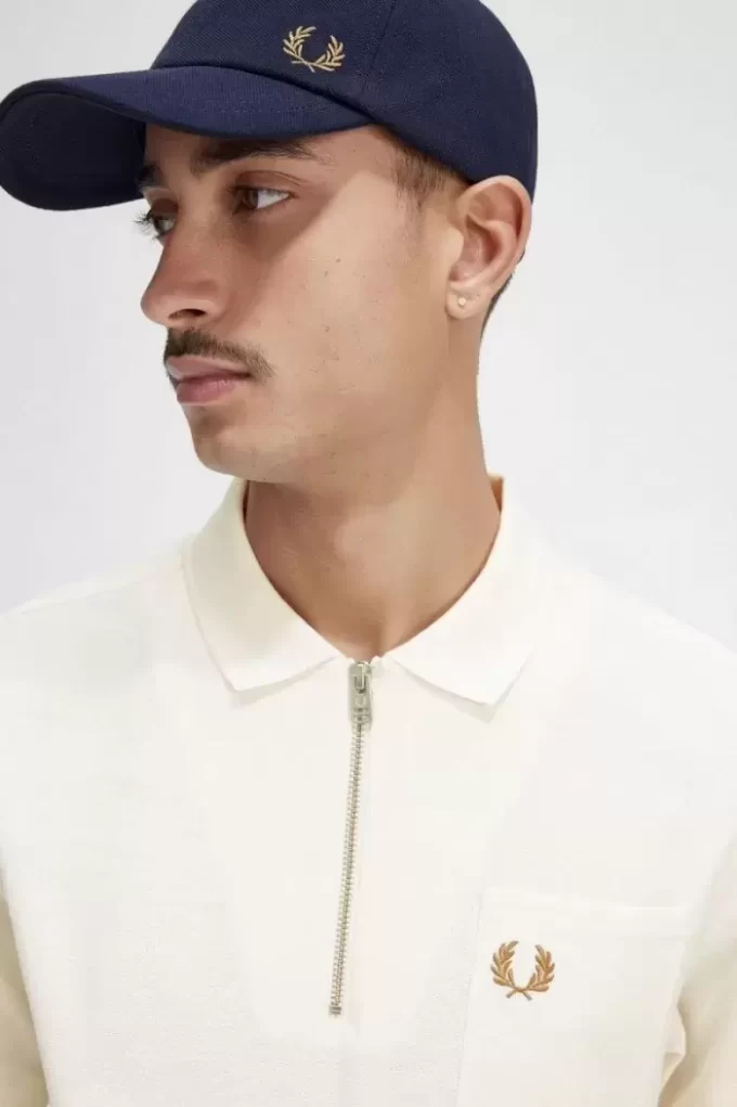Polo texturizado con cuello y cremallera para hombre
