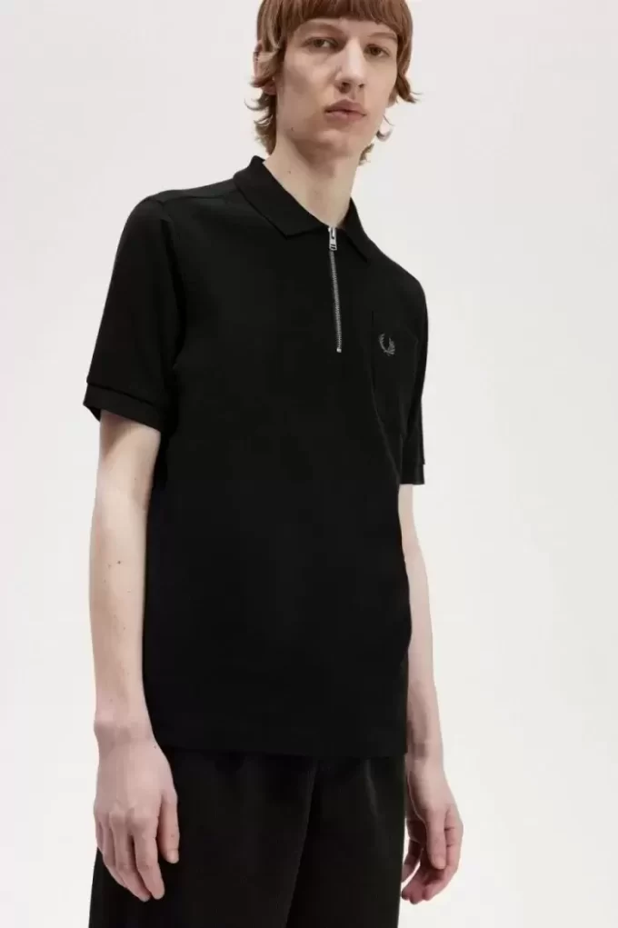 Polo texturizado con cuello y cremallera para hombre