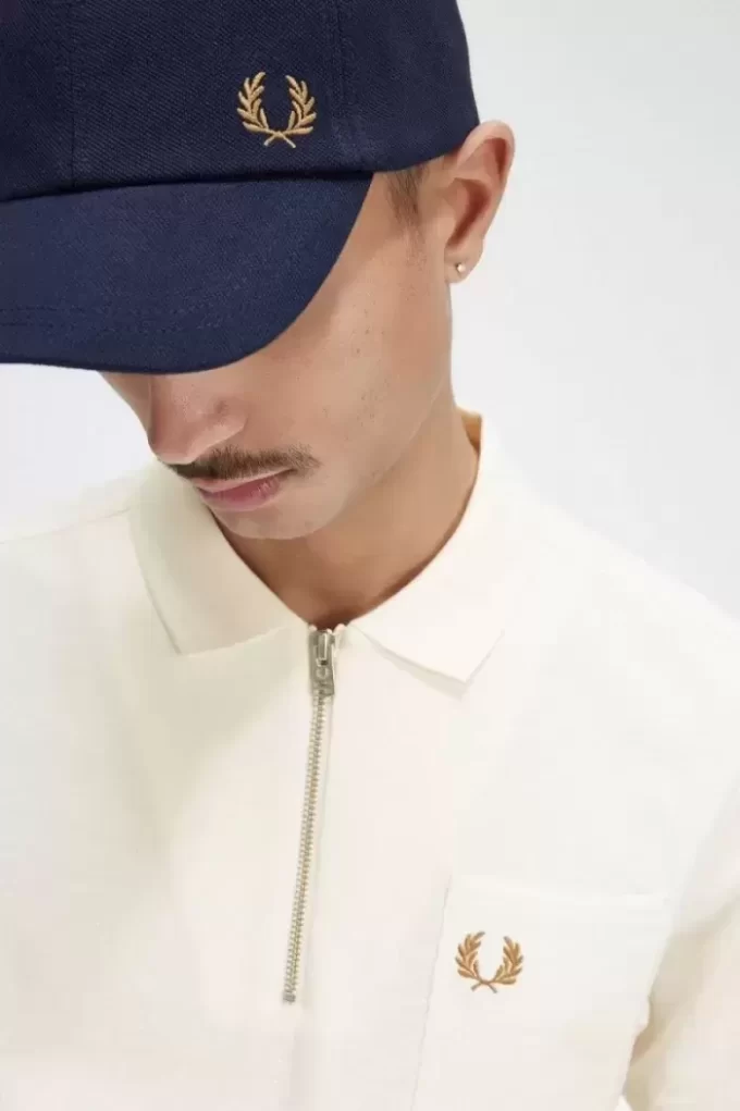 Polo texturizado con cuello y cremallera para hombre