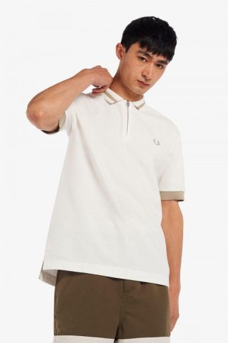 Polos con cuello con cremallera