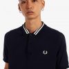Polos con mangas raglán Polos con mangas raglán